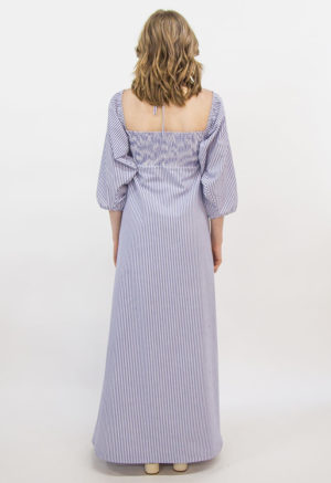 Back view of straight size model wearing Stripe Keyhole Maxi Dress.