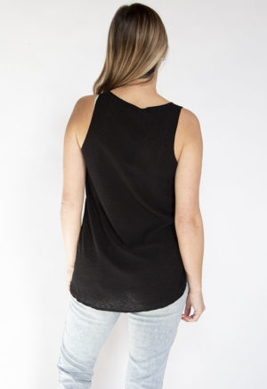 Back view of straight size model wearing Black Long Tank.