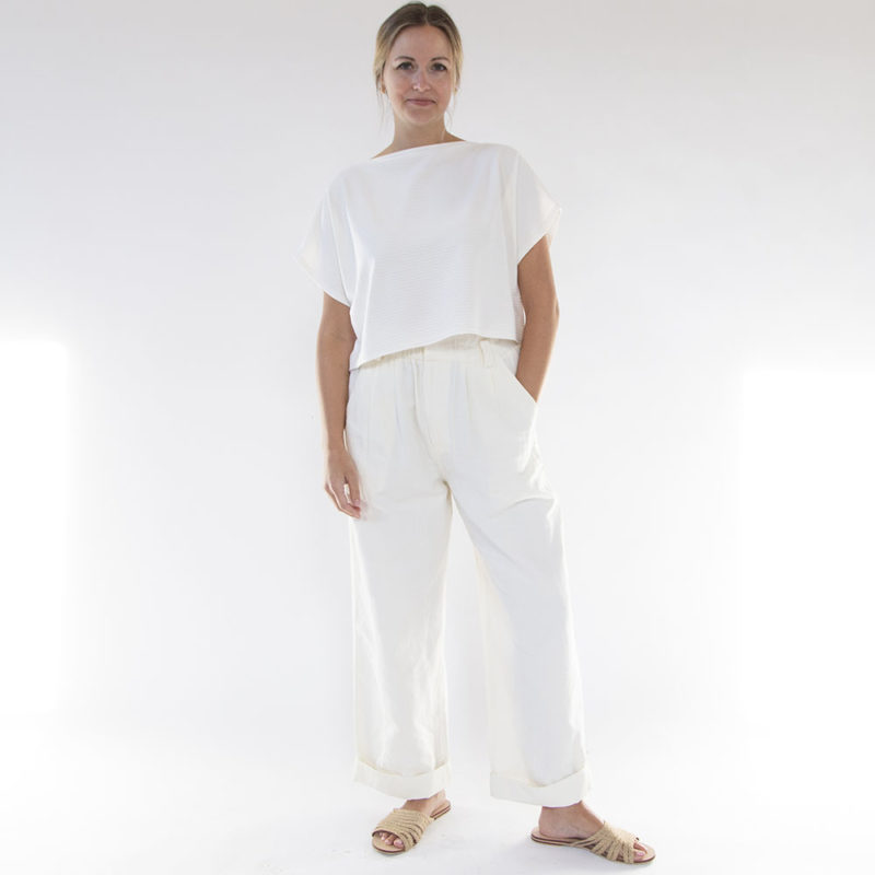 Front view of straight size model wearing Ivory Rib Cropped Rib Boatneck Top.
