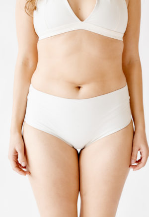 Front view of straight size model wearing White Hipster Bottoms.