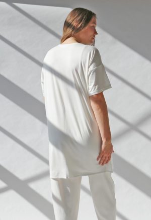 Back view of straight size model wearing White HDH Basics Tee Dress.