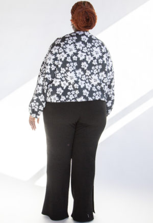 Back view of plus size model wearing Jungle Green Floral Cropped Boatneck Long-Sleeve Top.