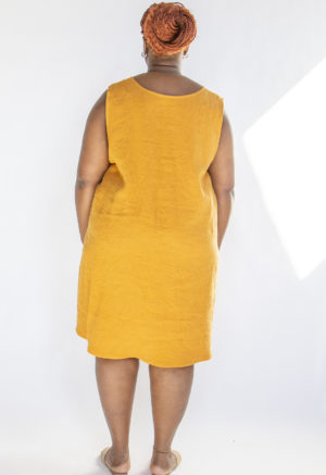 Back view of plus size model wearing Saffron Linen Shift Dress.