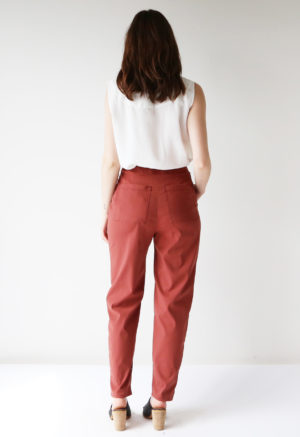 Back view of straight size model wearing Brick Satchel Pants.