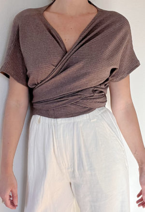 Front view of straight size model wearing Mauve Short-Sleeve Everything Top.