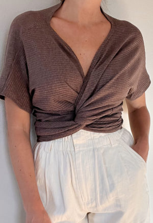Front view of straight size model wearing Mauve Short-Sleeve Everything Top.