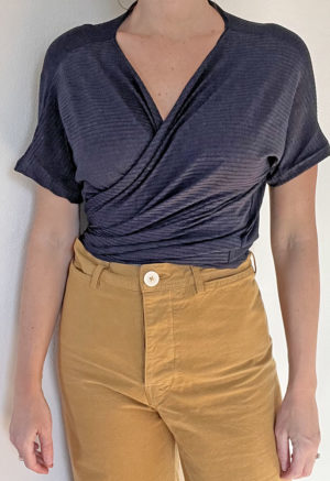 Front view of straight size model wearing Navy Short-Sleeve Everything Top.