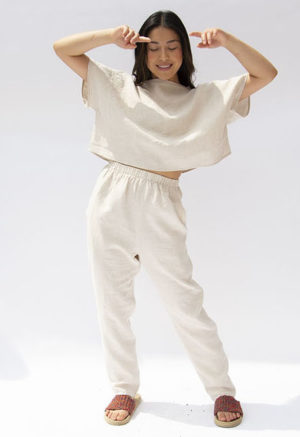 Front view of straight size model wearing Oatmeal Linen Boatneck Cropped Top.