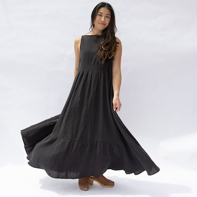 Front view of straight size model wearing Black Linen Boatneck Tank Dress.