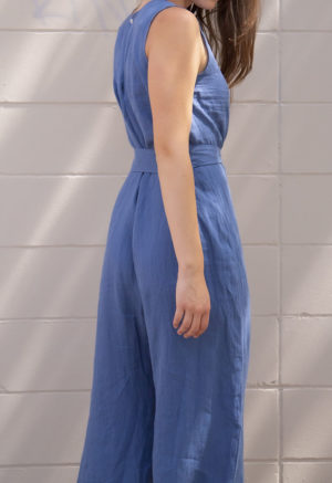 Side/back view of straight size model wearing Denim Linen Wide-Leg Jumper.