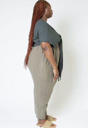 Side view of plus size model wearing Blue Spruce Everything Short Sleeve Top.