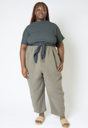 Front view of plus size model wearing Blue Spruce Everything Short Sleeve Top.