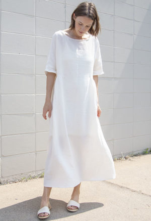 Front view of straight size model wearing Cream Gauze Gathered Midi Dress.