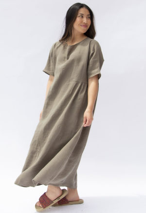 Front view of straight size model wearing Moss Linen Gathered Midi Dress.