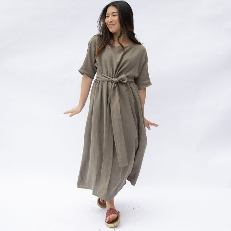 Front view of straight size model wearing Moss Linen Gathered Midi Dress.