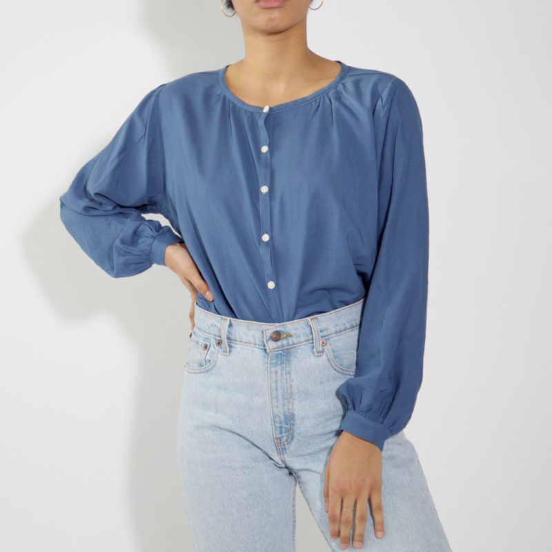 Front view of straight size model wearing French Blue Zinnia Top.
