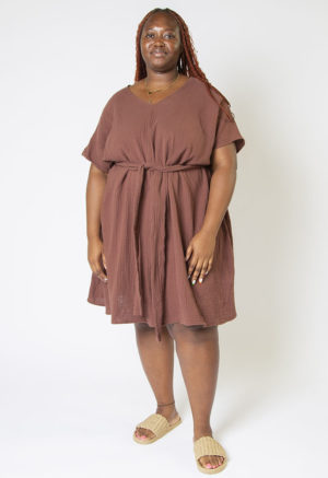 Front view of plus size model wearing Raisin Cotton Reversible Smock Dress.