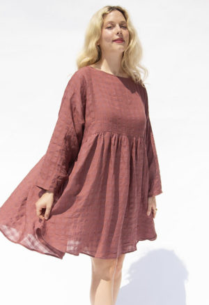 Front view of straight size model wearing Blush Check Short Oversized Dress.