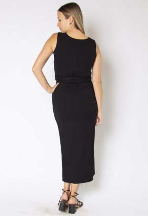 Back view of straight size model wearing Black Rib Sleeveless Wrap Dress.