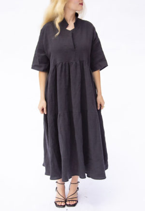 Front view of straight size model wearing Black Linen Tiered Lapel Dress.
