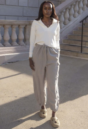 Front view of straight size model wearing Ivory Rib Cropped Collar Rib Top.
