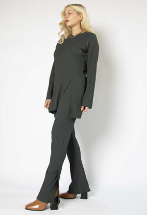 Front/side view of straight size model wearing Blue Spruce Flare Rib Pant.