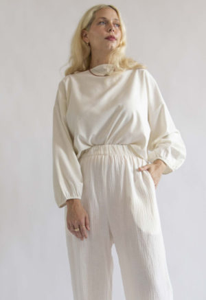 Front view of straight size model wearing Cream Silk Boatneck Cropped Balloon Sleeve Top.