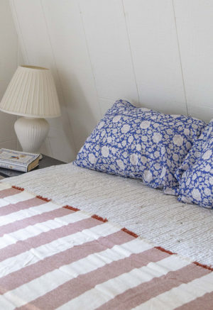 Blue & White Floral Pillow Cases on bed