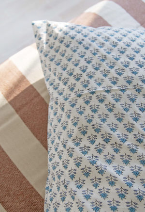 Close-up of White & Teal Floral Pillow Case