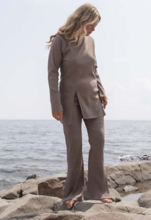 Front view of straight size model wearing Mauve Flare Rib Pants.