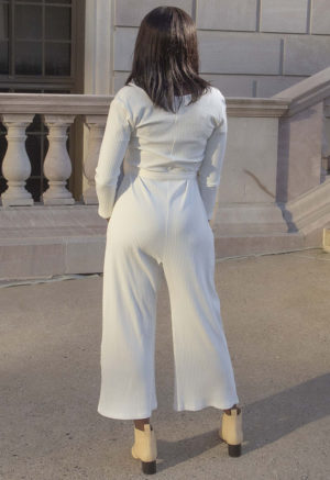 Back view of straight size model wearing Ivory Rib Long Sleeve Reversible Jumper.