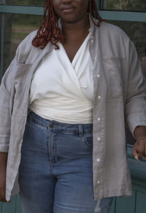 Front view of plus size model wearing Pebble Gray Work Jacket.