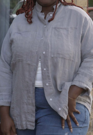 Front view of plus size model wearing Pebble Gray Work Jacket.