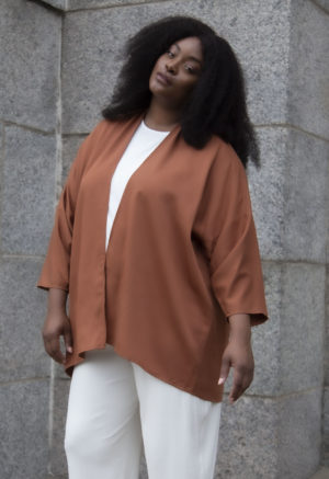 Front view of plus size model wearing Copper Lyocell Easy Jacket.