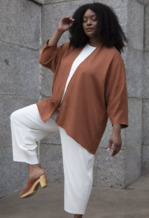 Front view of plus size model wearing Copper Lyocell Easy Jacket.