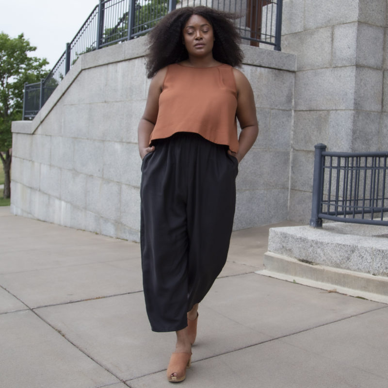 Front view of plus size model wearing Copper Lyocell Reversible Scoop Tank.
