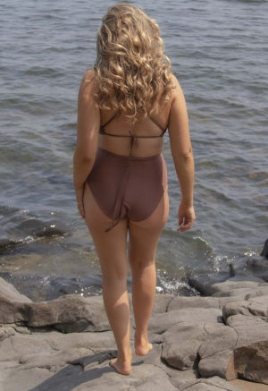 Back view of straight size model wearing Chestnut Ruched Top.