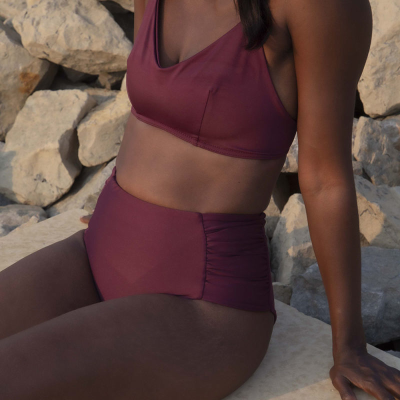 Front/side view of straight size model wearing Fig Ruched High-Waisted Bottoms.
