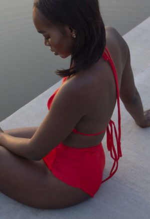 Side view of straight size model wearing Valentine String Bikini Top.