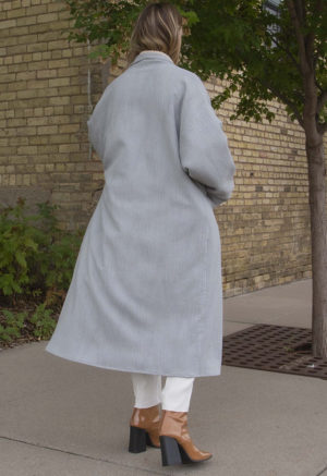 Back view of straight size model wearing Mist Updated Oversized Jacket.