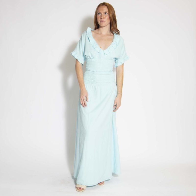 Front view of straight size model wearing Capri Blue Smocked-Waist Maxi Skirt.