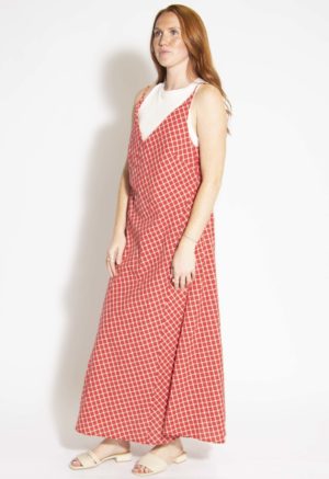 Front/side view of straight size model wearing Red & Cream Checkered V-Neck Maxi Dress.