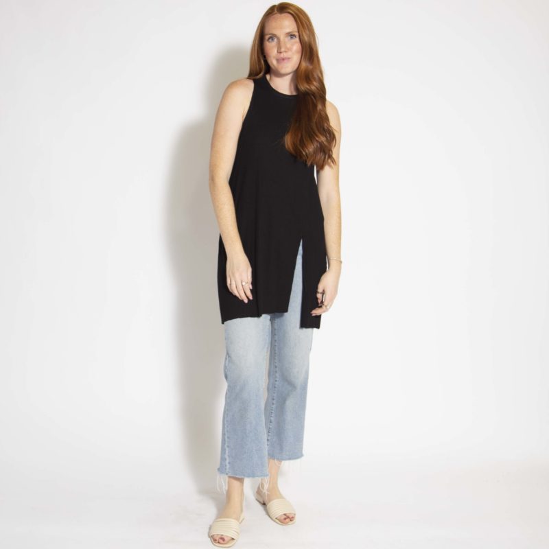Front view of straight size model wearing Black Sleeveless Tunic Slit Rib Top.