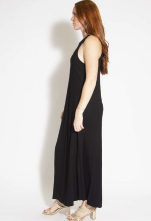 Side view of straight size model wearing Black Rib Sleeveless Maxi Dress.