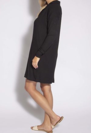 Side view of straight size model wearing Black Collar Rib Tunic/Dress.