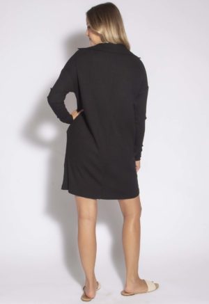 Back view of straight size model wearing Black Collar Rib Tunic/Dress.