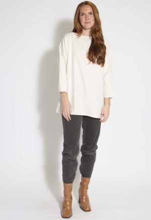 Front view of straight size model wearing Cream Silk Tunic Pullover.