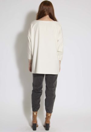 Back view of straight size model wearing Cream Silk Tunic Pullover.