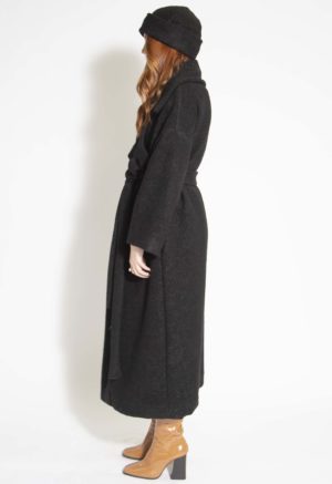 Side view of straight size model wearing Black Wool Boucle Bucket Hat.