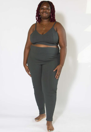 Front view of plus size model wearing Blue Spruce V-Neck Bralette and Rib Leggings.